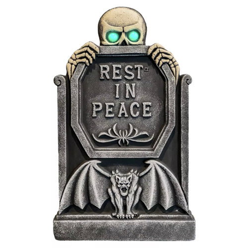 Grabstein Skelett mit grün leuchtenden Augen